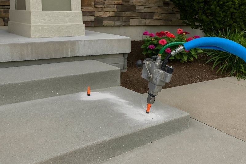 How Commercial Concrete Mudjacking Restores Uneven Surfaces